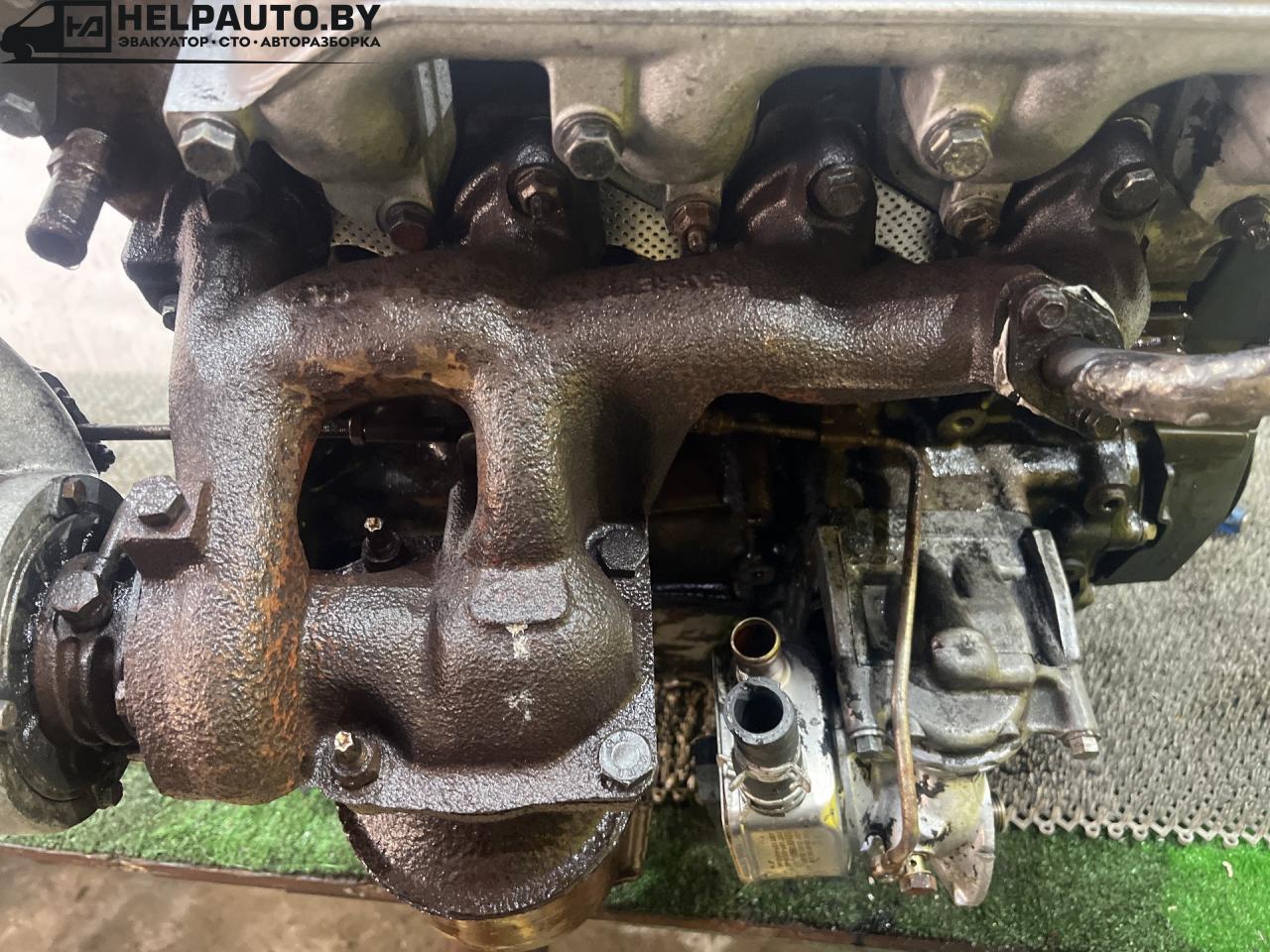 коллектор выпускной Ford Mondeo 2 поколение 1999, 1.8 л., RFN, дизель, МКПП, белый, универсал, передний привод - фото №1