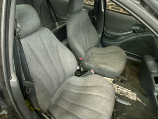 салон (комплект сидений) Pontiac Sunfire 1 поколение 1999, 2.2 л., бензин, АКПП, черный, передний привод, LIKVIDACIYA, SKLADA