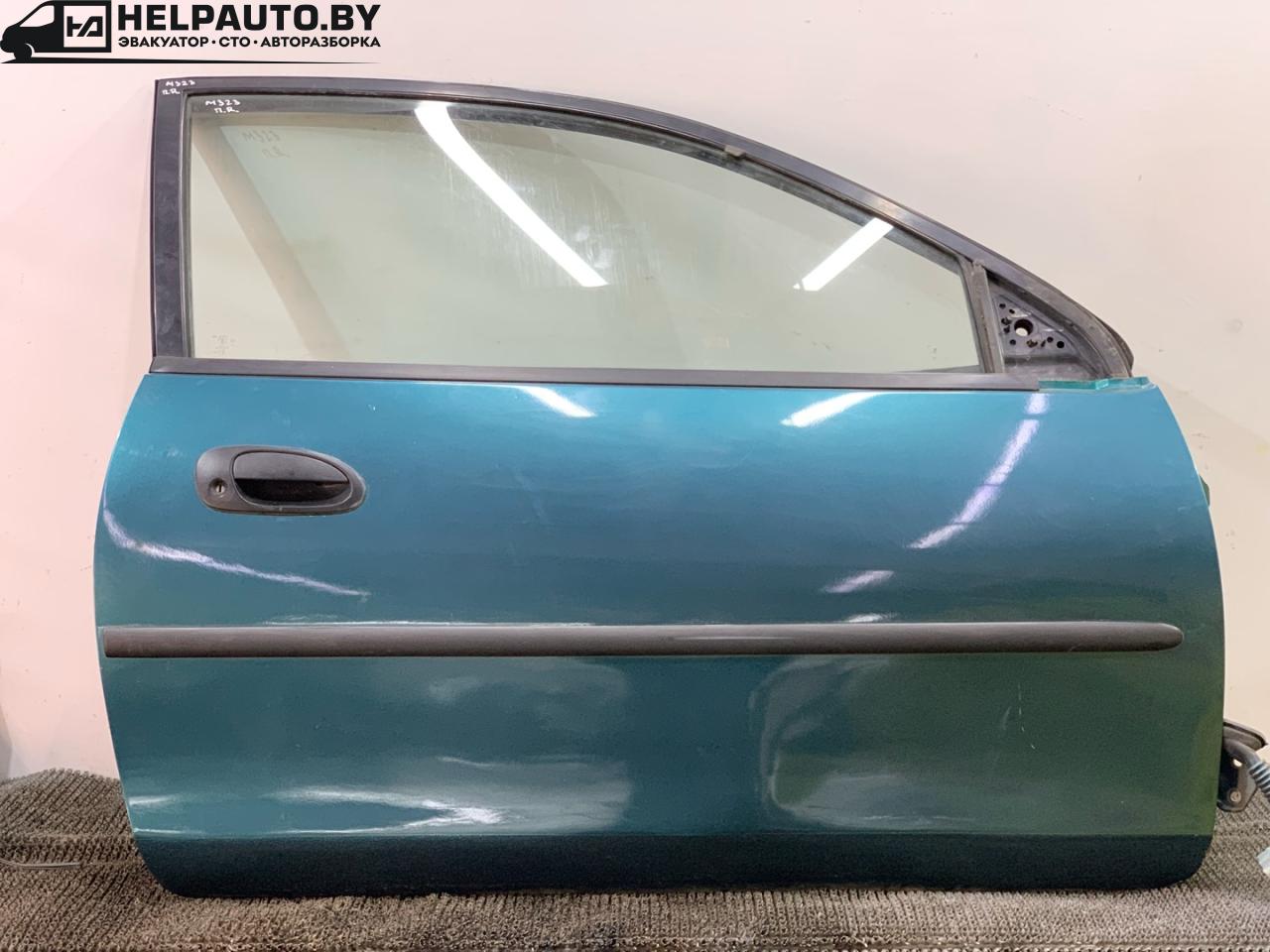 дверь передняя правая Mazda 323 6 поколение 1998, 1.4 л., бензин, МКПП, синий, хетчбэк 3 дв., передний привод - фото №1