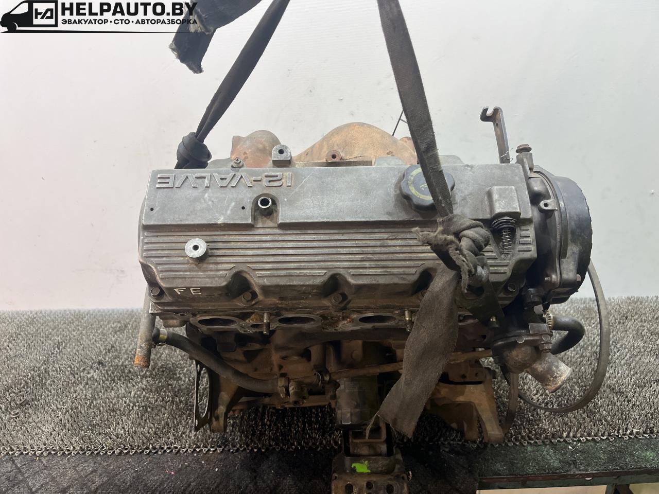 двигатель Kia Sportage 1 поколение 1999, 2.0 л., FE (16V), бензин, МКПП, синий, внедорожник 5 дв., полный подключаемый привод, FE - фото №1