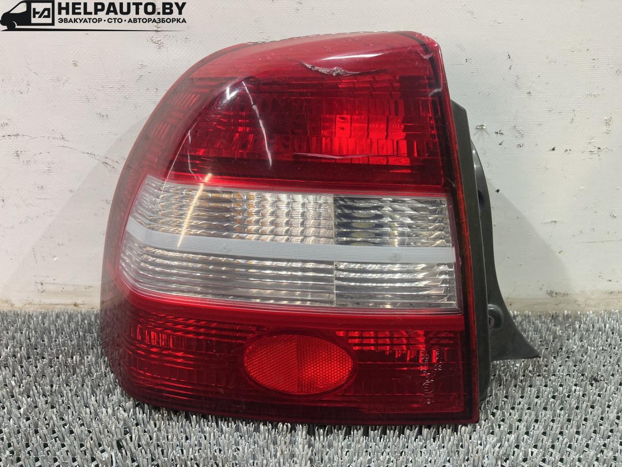 фонарь задний левый Kia Shuma 1 поколение 1999, 1.5 л., бензин, МКПП, красный, хетчбэк 5 дв., передний привод, 9A14 - фото №1