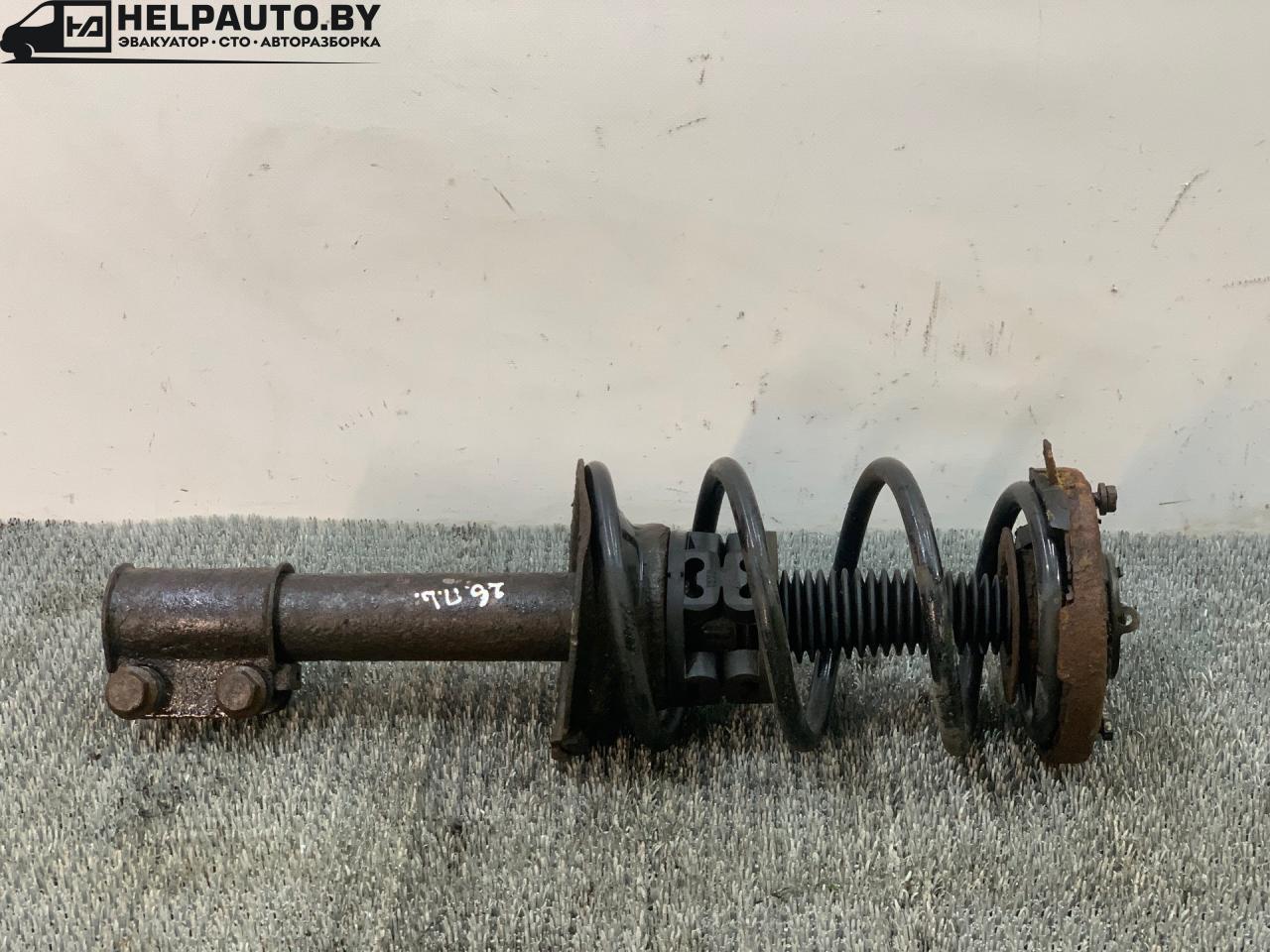 стойка передняя левая Renault Scenic 1 поколение 1997, 1.9 л., F8Q 786, дизель, МКПП, серый, передний привод - фото №1