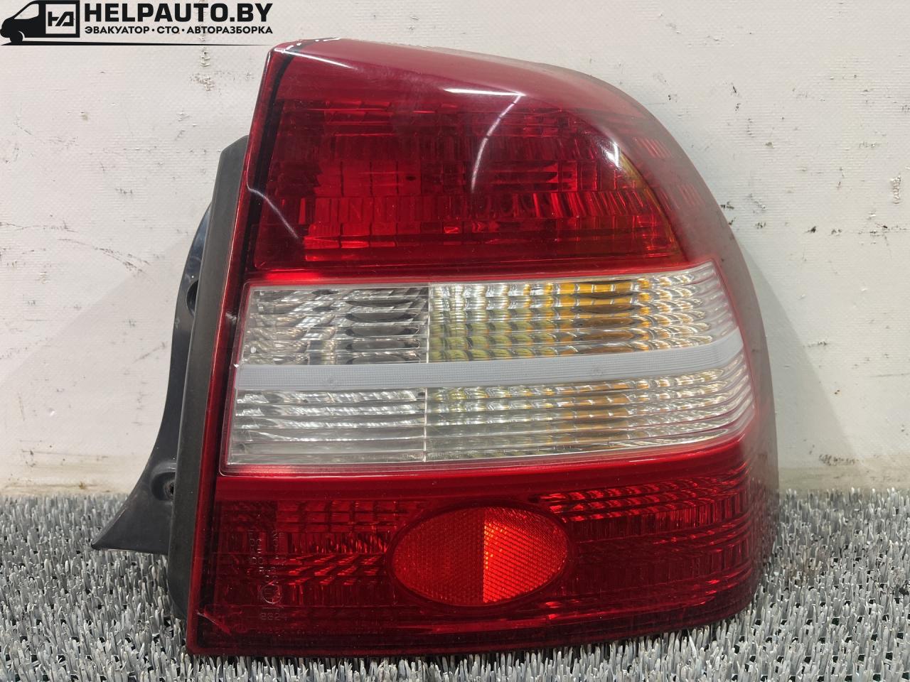 фонарь задний правый Kia Shuma 1 поколение 1999, 1.5 л., бензин, МКПП, красный, хетчбэк 5 дв., передний привод - фото №1