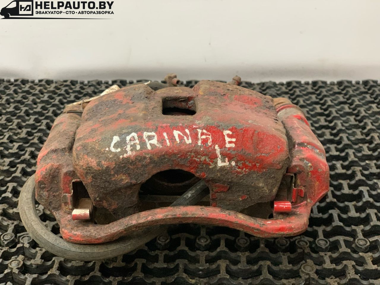 суппорт передний левый Toyota Carina E 1 поколение T190 1995, 2.0 л., 2C, дизель, МКПП, бордовый, хетчбэк 5 дв., передний привод - фото №1