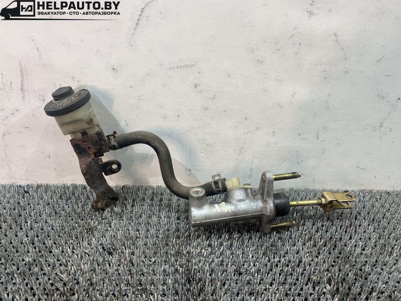 цилиндр сцепления главный Toyota Carina E 1 поколение T190 1995, 1.6 л., 4A-FE, бензин, МКПП, зелёный, хетчбэк 5 дв., передний привод - фото №1