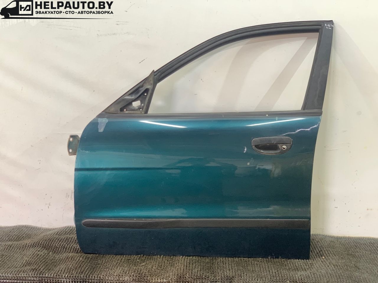 дверь передняя левая Daewoo Nubira J100 1998, 1.6 л., бензин, МКПП, зелёный металлик, хетчбэк 5 дв. - фото №1