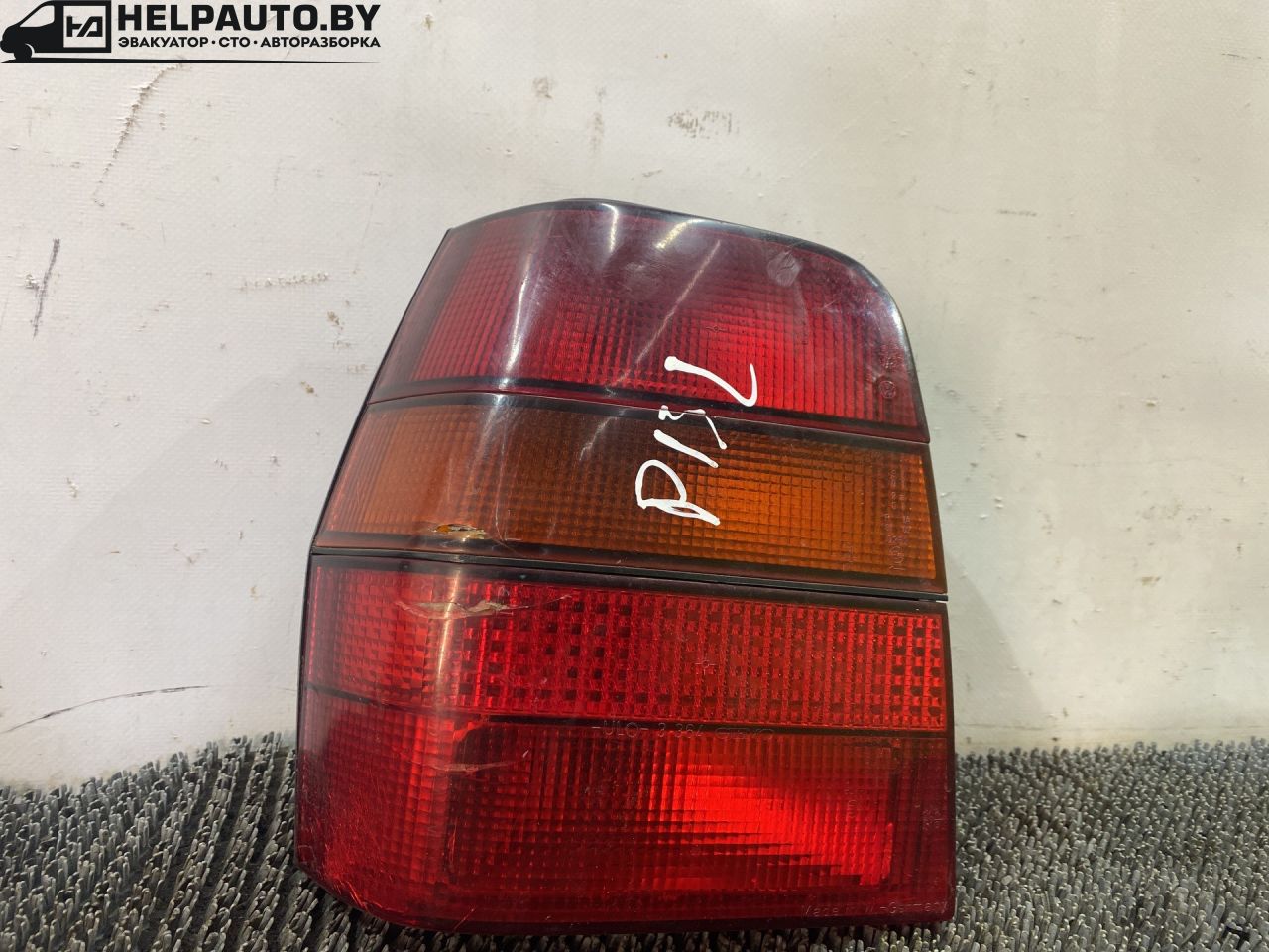 фонарь задний левый Volkswagen Polo 2 поколение 1990, 1.3 л., бензин, МКПП, синий, хетчбэк 3 дв., передний привод - фото №1