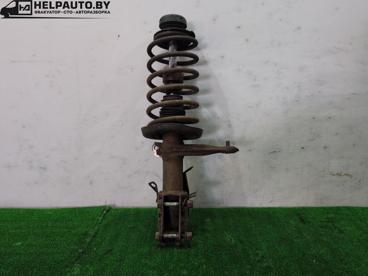 стойка передняя левая Audi 80 B3 1990, 1.6 л., PP, бензин, МКПП, оранжевый, седан, передний привод - фото №1