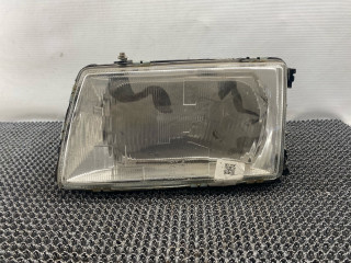 фара левая Audi 100 С3 1986