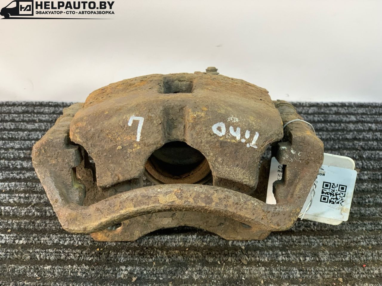 суппорт передний левый Nissan Almera Tino V10 2001, 2.2 л., YD22DDT, дизель, МКПП, берюзовый, минивэн, передний привод - фото №1