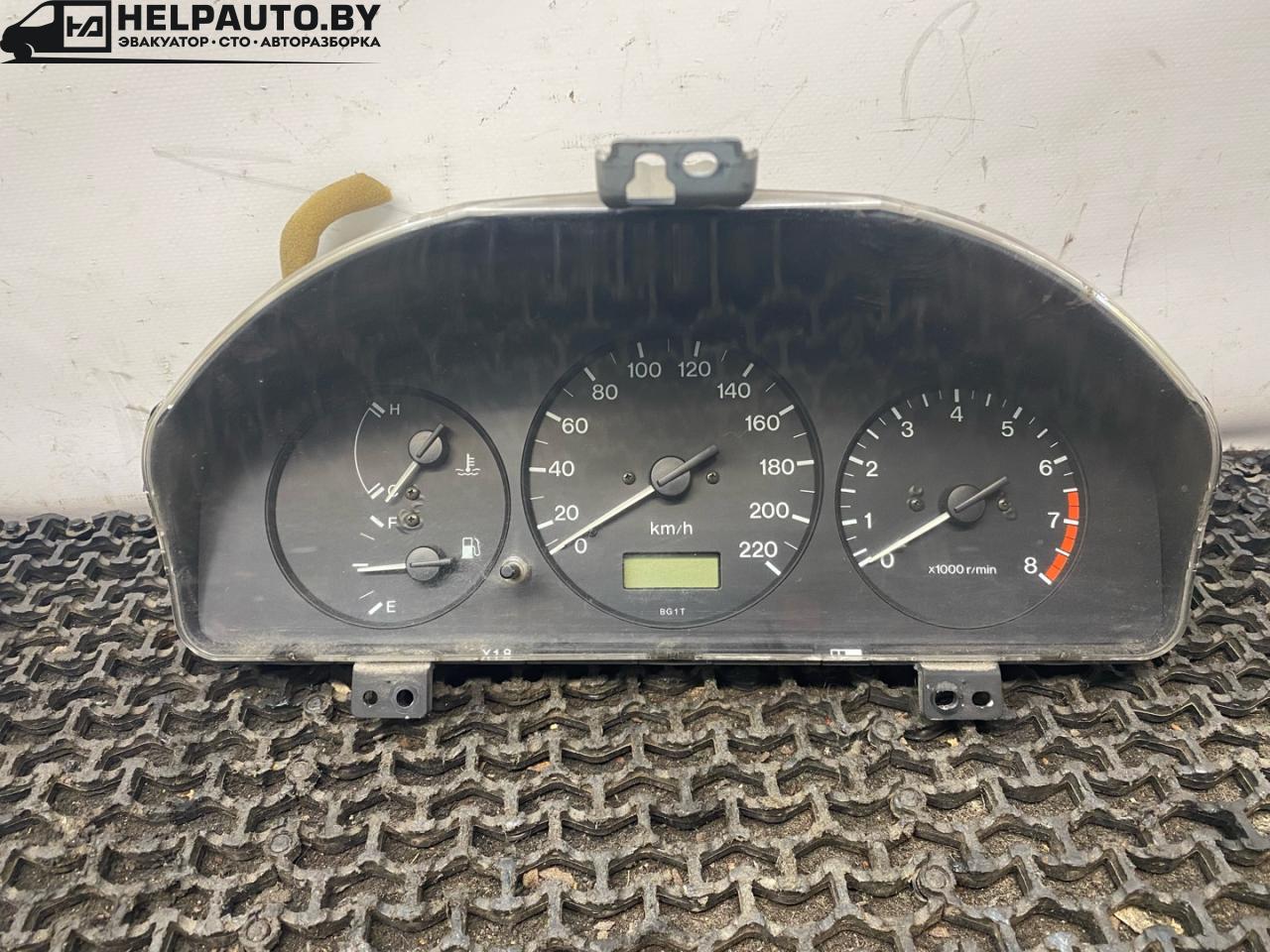 щиток приборов (приборная панель) Mazda 323 6 поколение 1998, 1.5 л., бензин, МКПП, синий, хетчбэк 3 дв., передний привод - фото №1