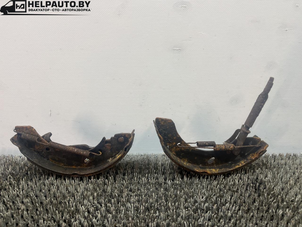 механизм развода задних тормозных колодок Hyundai Coupe RD 1998, 2.0 л., бензин, МКПП, бордовый, купе, передний привод - фото №1