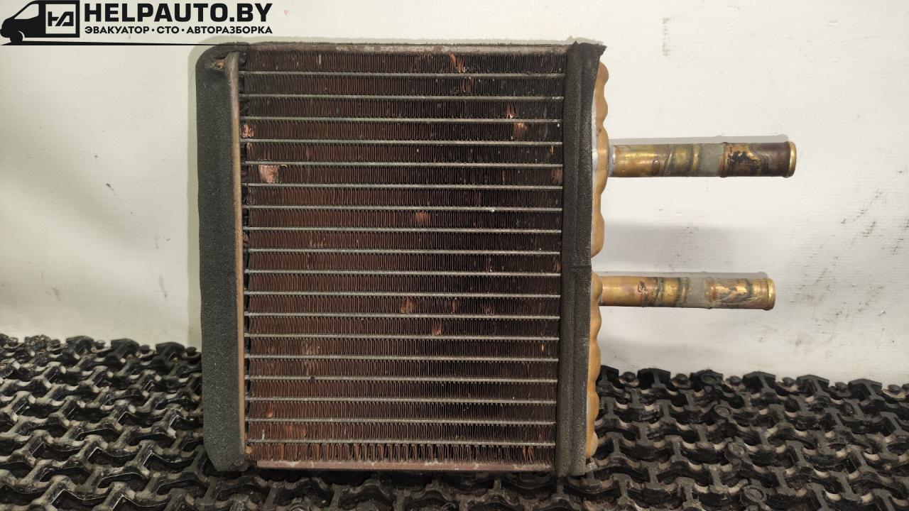 радиатор отопителя (печки) Suzuki Baleno 1 поколение 2002, 1.5 л., бензин, МКПП, чёрный, седан - фото №1