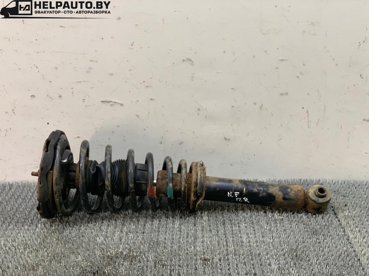 стойка передняя правая Nissan Primera P11 1998, 2.0 л., SR20DE, бензин, 5МКПП, серебристый, седан, передний привод - фото №1