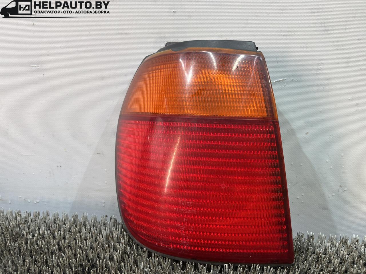 фонарь задний левый Nissan Primera P11 (1996 - 2000), 1.8 л., бензин, МКПП, универсал, передний привод - фото №1