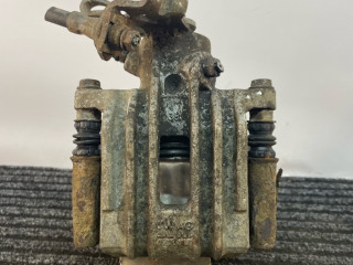 суппорт задний левый Volkswagen Golf 5 поколение 2008, 1.4 л., BUD, бензин, 5МКПП, синий, хетчбэк 5 дв., передний привод