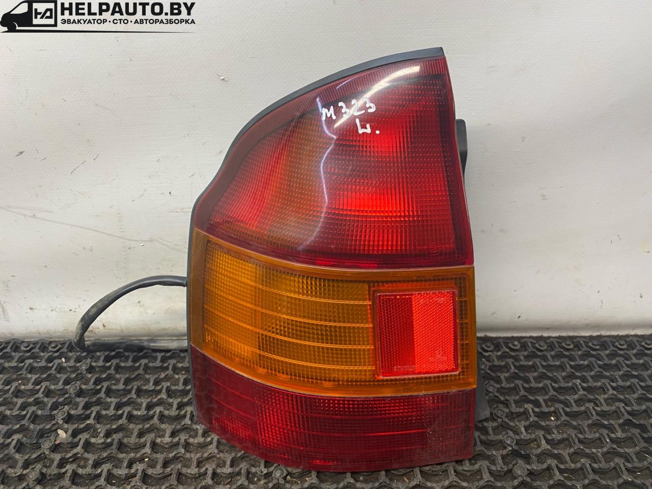 фонарь задний левый Mazda 323 6 поколение 1998, 1.5 л., бензин, МКПП, синий, хетчбэк 3 дв., передний привод, RR2254L - фото №1