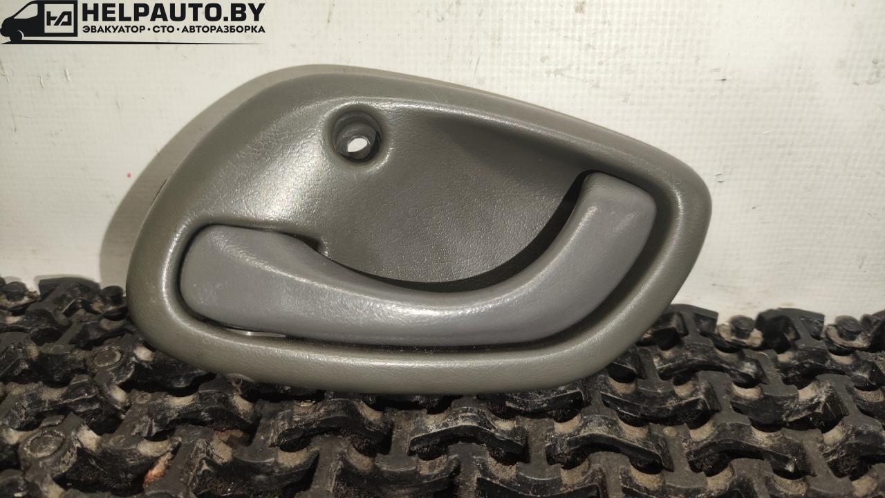 ручка внутренняя передняя левая Suzuki Baleno 1 поколение 2002, 1.5 л., бензин, МКПП, чёрный, седан - фото №1