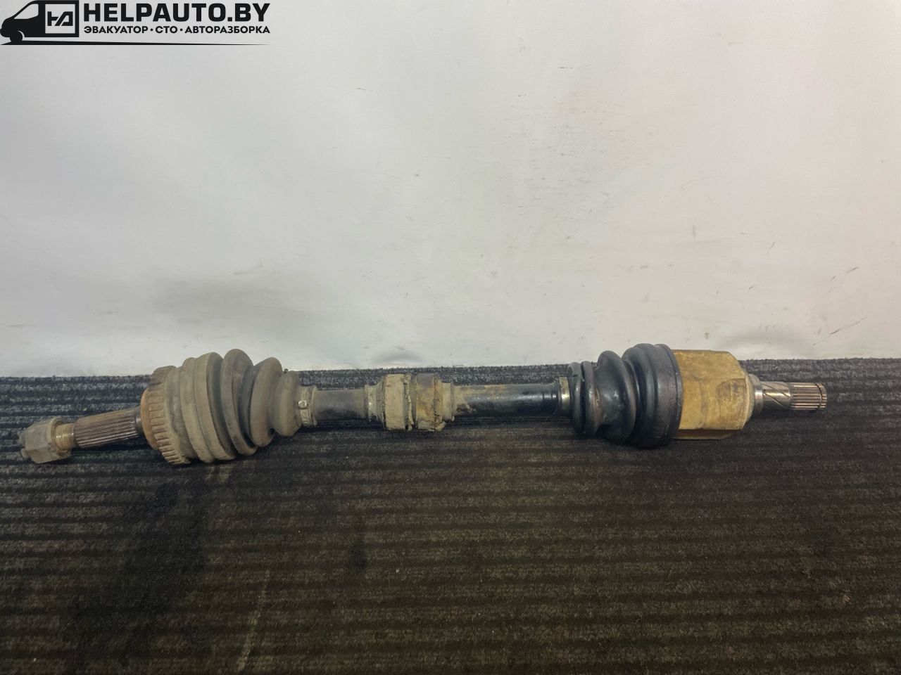 полуось передняя левая (приводной вал, ШРУС) Nissan Almera Tino V10 2001, 1.8 л., QG18DE, бензин, 5МКПП, зеленый, минивэн - фото №1