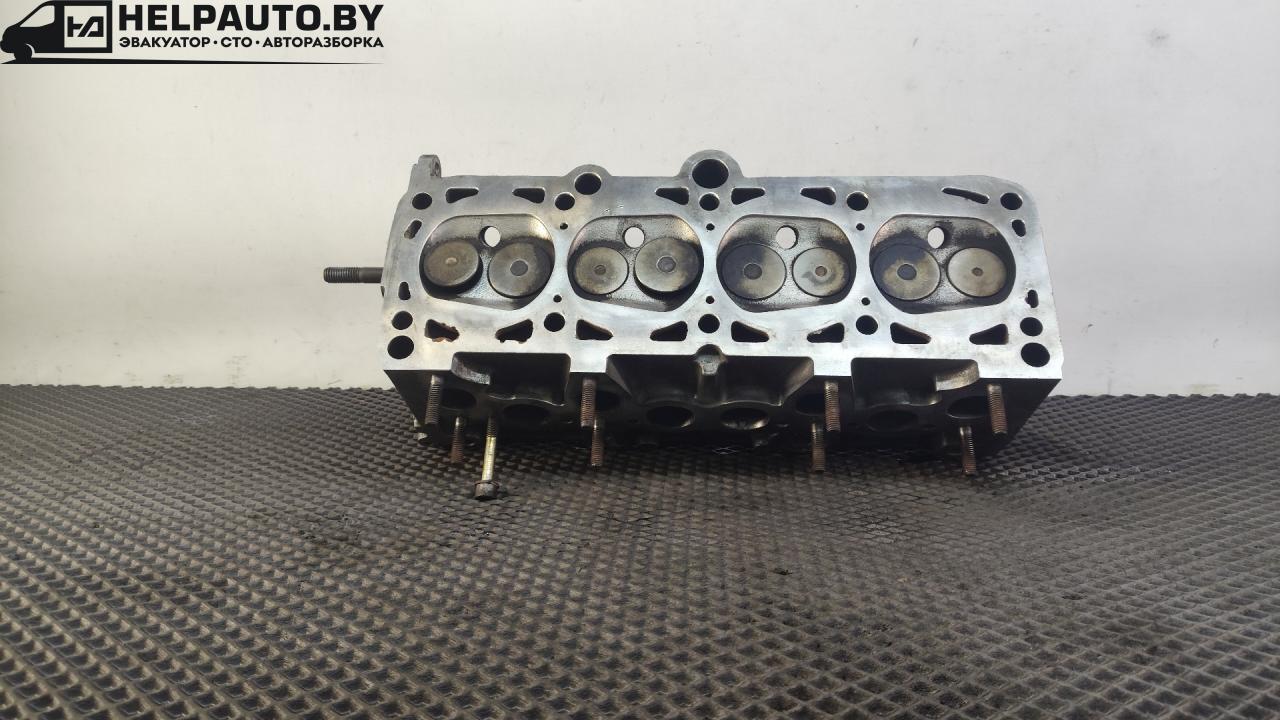 головка блока цилиндров Volkswagen Passat B3 1991, 1.8 л., бензин, МКПП, белый, седан, передний привод, 026103373Q - фото №1