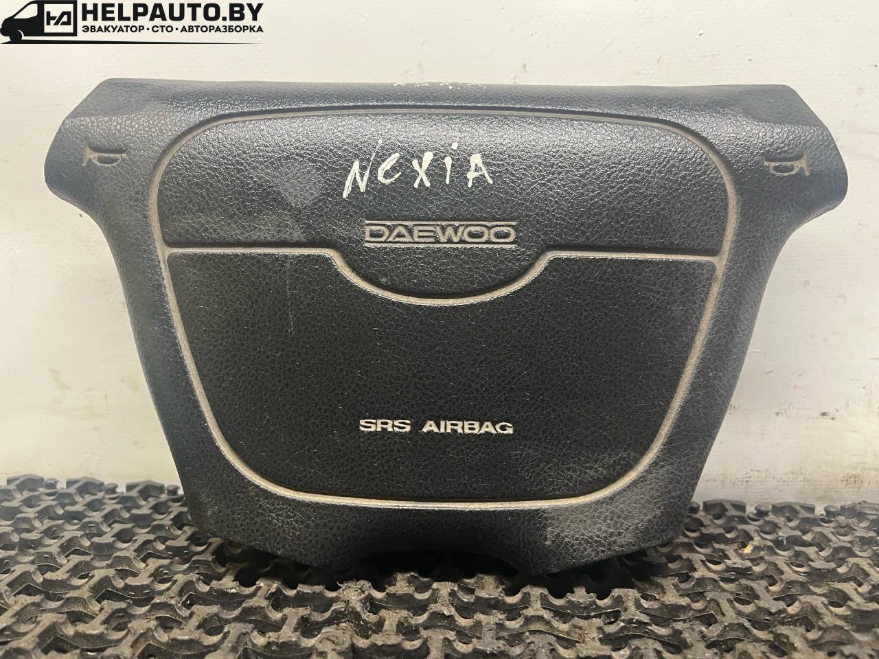 подушка безопасности водителя Daewoo Nexia 1 поколение 2000, 1.5 л., G15MF, бензин, МКПП, красныц, хетчбэк 5 дв., передний привод, T1870300990 - фото №1