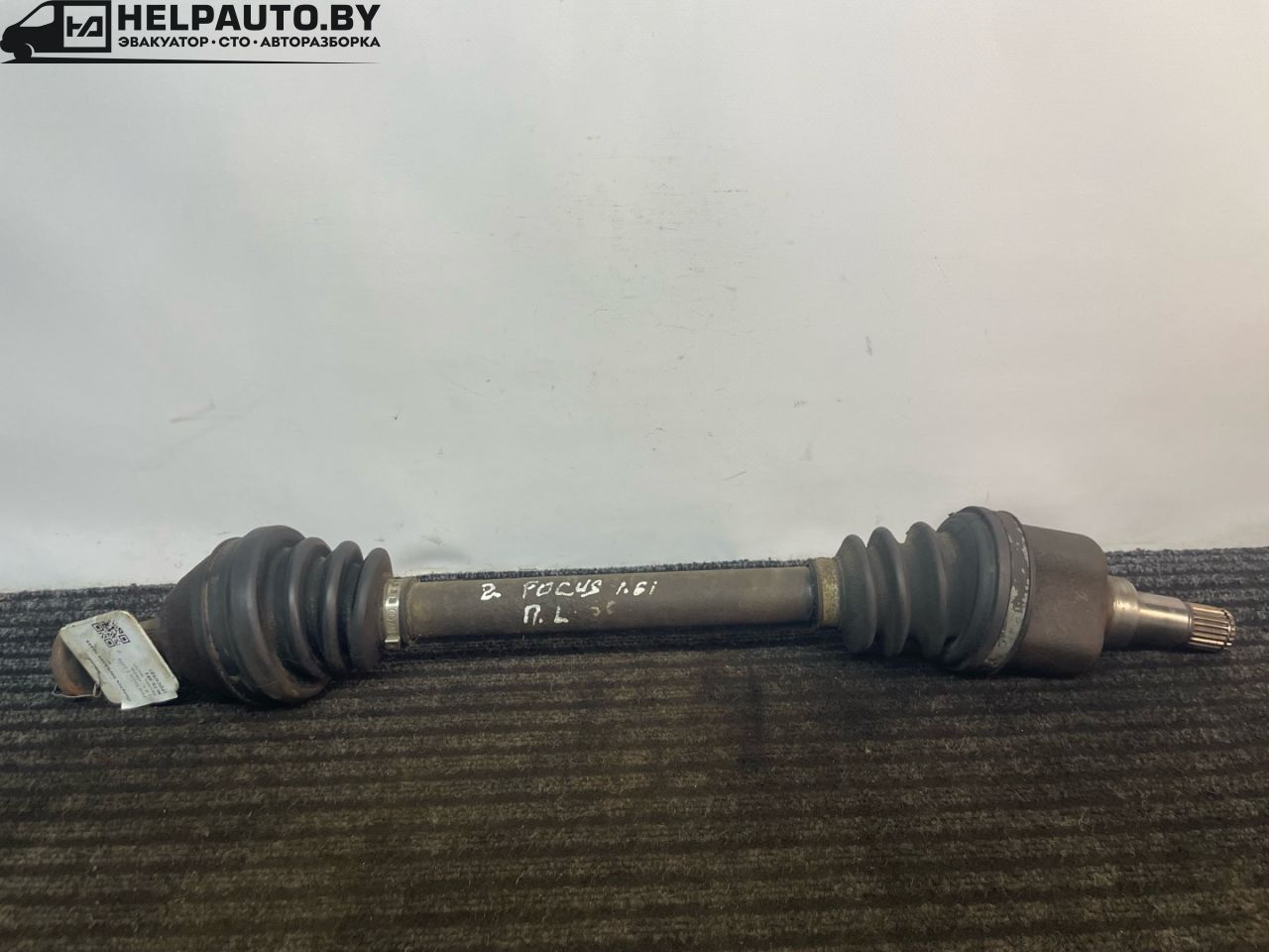 полуось передняя левая (приводной вал, ШРУС) Ford Focus 2 поколение 2006, 1.6 л., HWDA, бензин, МКПП, красный, хетчбэк 5 дв., передний привод - фото №1
