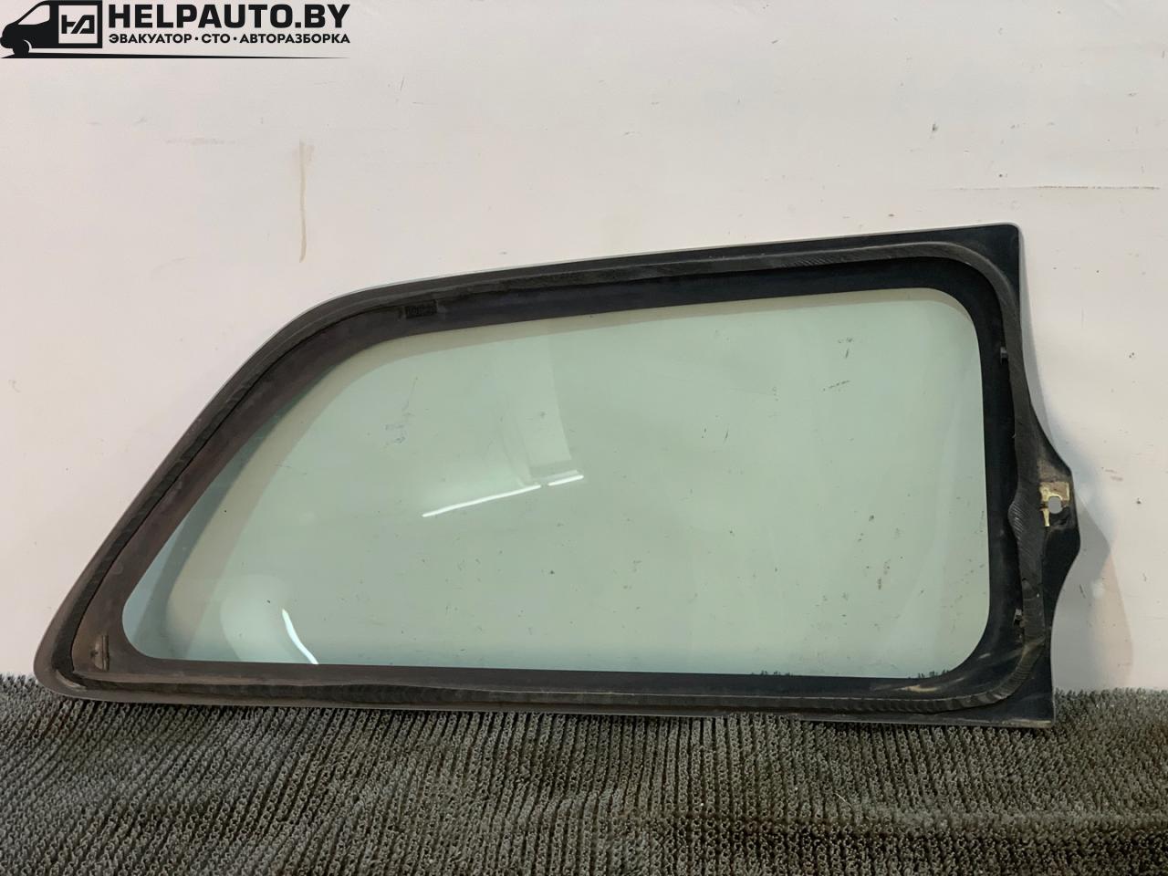 стекло кузовное боковое левое Mazda 323 6 поколение 1998, 1.5 л., бензин, МКПП, синий, хетчбэк 3 дв., передний привод - фото №1