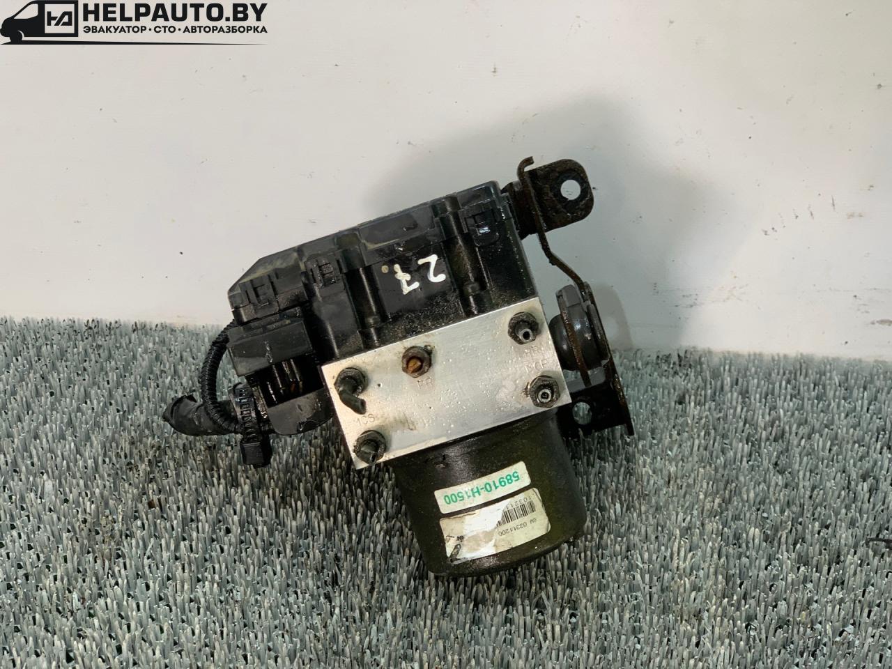 блок ABS Hyundai Terracan 1 поколение 2003, 2.5 л., D4BH, дизель, АКПП, серебристый, внедорожник 5 дв., полный подключаемый привод, 58910-H1500 - фото №1