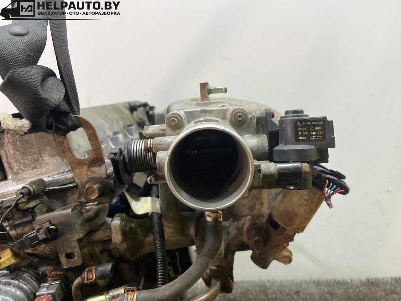 заслонка дроссельная Kia Sephia 2 поколение (1997 - 2001), 1.5 л., BFD, бензин, МКПП, передний привод, OK24720660 - фото №1