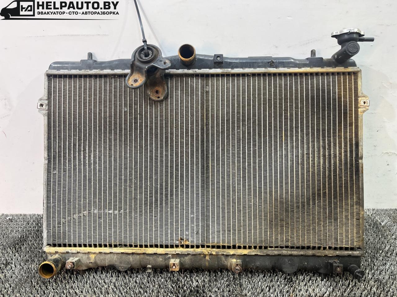 радиатор (основной) Hyundai Coupe RD 1998, 2.0 л., бензин, МКПП, бордовый, купе, передний привод, PA66-GF33 - фото №1