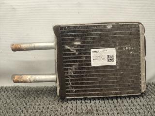 радиатор отопителя (печки) Kia Carnival UP/GQ 2000, 2.9 л., дизель, 5МКПП, черный, минивэн, передний привод