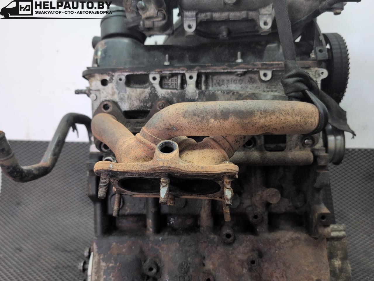 коллектор выпускной Volkswagen Jetta 4 поколение 2001, 2.0 л., AQY, бензин, МКПП, синий, седан, передний привод - фото №1