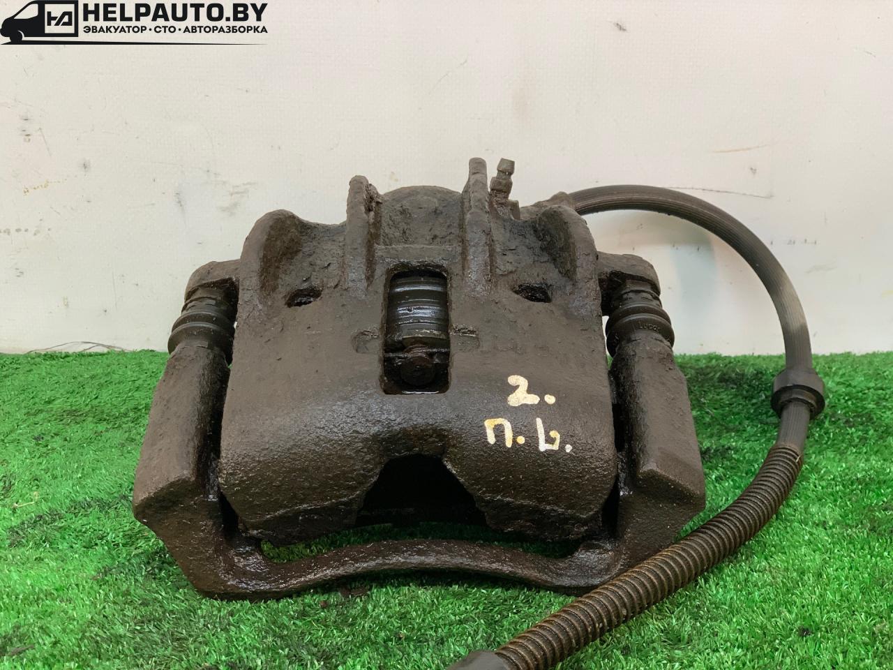 суппорт передний левый Peugeot 306 1 поколение 1997, 1.9 л., дизель, МКПП, белый, универсал, передний привод - фото №1