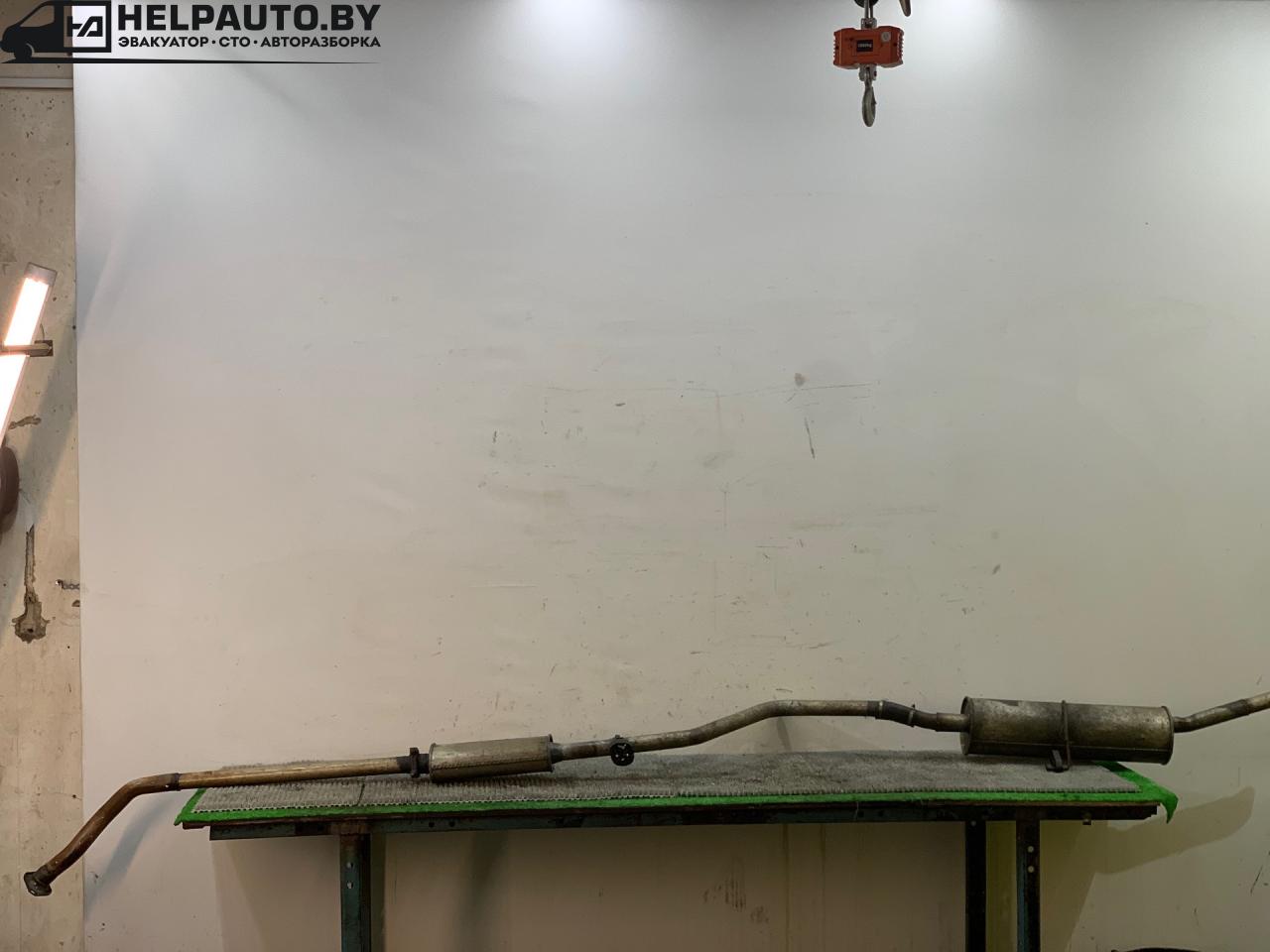 глушитель Peugeot 306 1 поколение 1997, 1.9 л., дизель, МКПП, белый, универсал, передний привод - фото №1