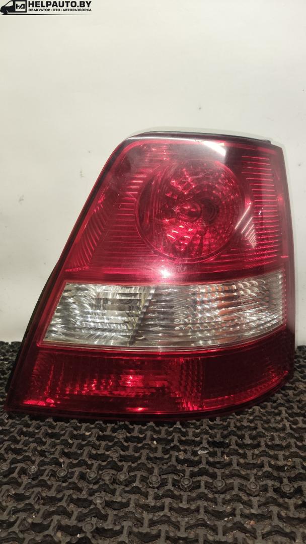 фонарь задний правый Kia Sorento 1 поколение 2006, 2.5 л., дизель, МКПП, серебристый, внедорожник 5 дв., полный подключаемый привод, 92402-3E0 - фото №1