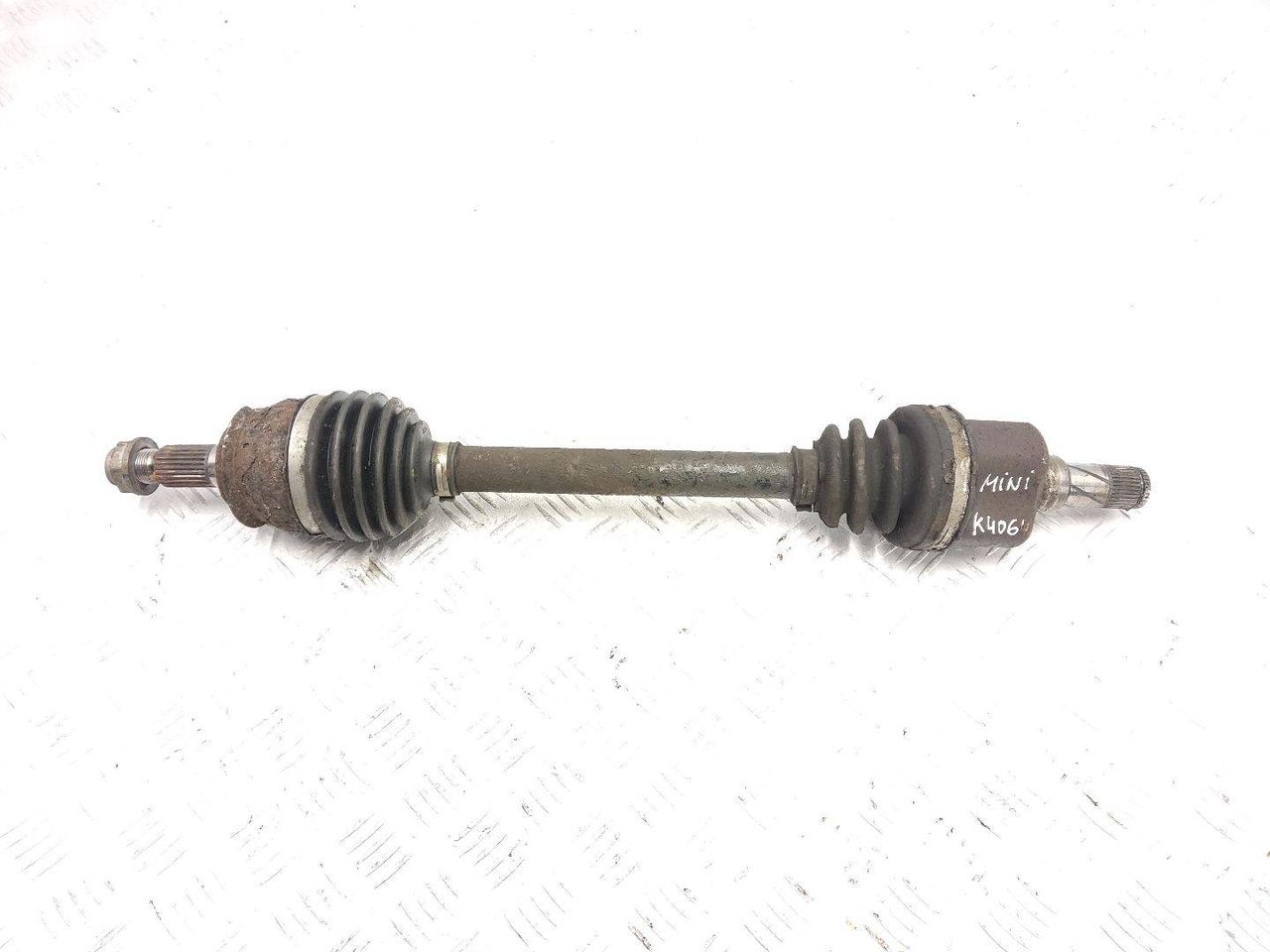 полуось передняя левая (приводной вал, ШРУС) Mini Cooper 2 поколение R56 2009, 1.4 л., i, N12 B14 A, бензин, 6МКПП, chili red / 851, хетчбэк 3 дв., передний привод, правый руль, 31608605473