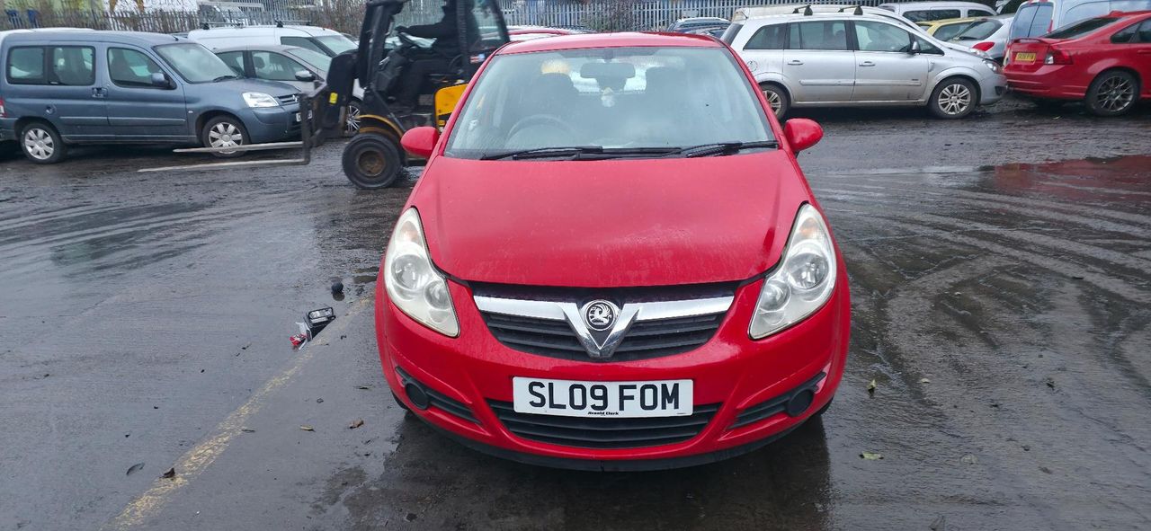 Opel Corsa D 2009 - фото №1
