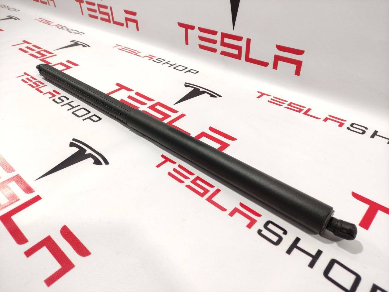 амортизатор крышки багажника (3-5 двери) Tesla Model X 1 поколение 2017, 1129698-00-A - фото №1