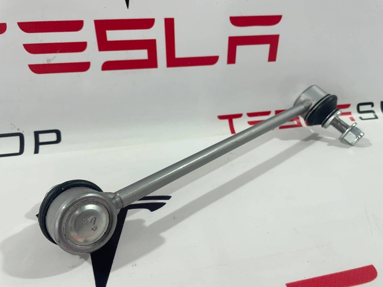 стойка стабилизатора Tesla Model Y 1 поколение 2022, 1044396-00-D, 1188396-00-B - фото №1