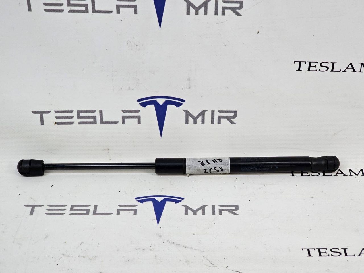 Амортизатор (упор) капота Tesla Model X 1 поколение 2018, 1053606-00 - фото №1