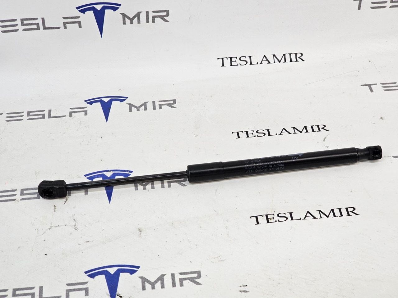 Амортизатор (упор) капота Tesla Model 3 2 поколение 2024, 1645989-00 - фото №1