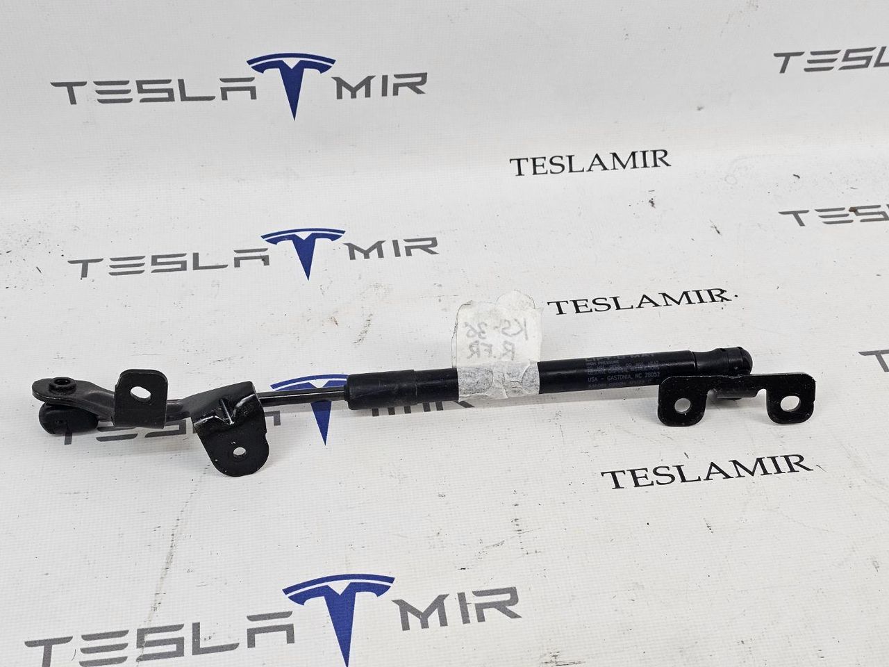 Амортизатор (упор) капота Tesla Model 3 1 поколение 2023, 1091870-00, 1089586-00, 1091472-00 - фото №1