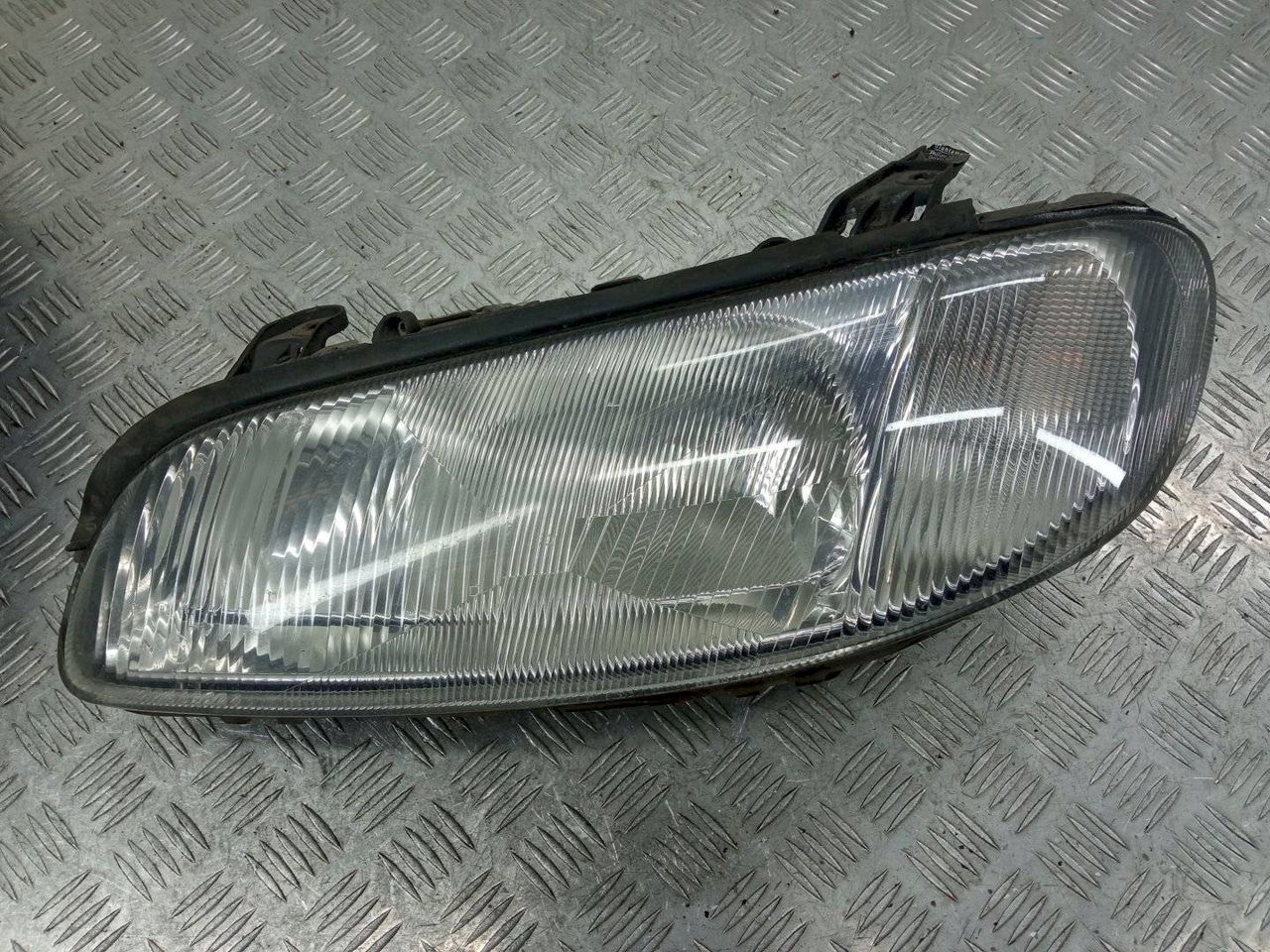 фара левая Opel Omega B [рестайлинг] 2002, 90487567, 1AG006920
