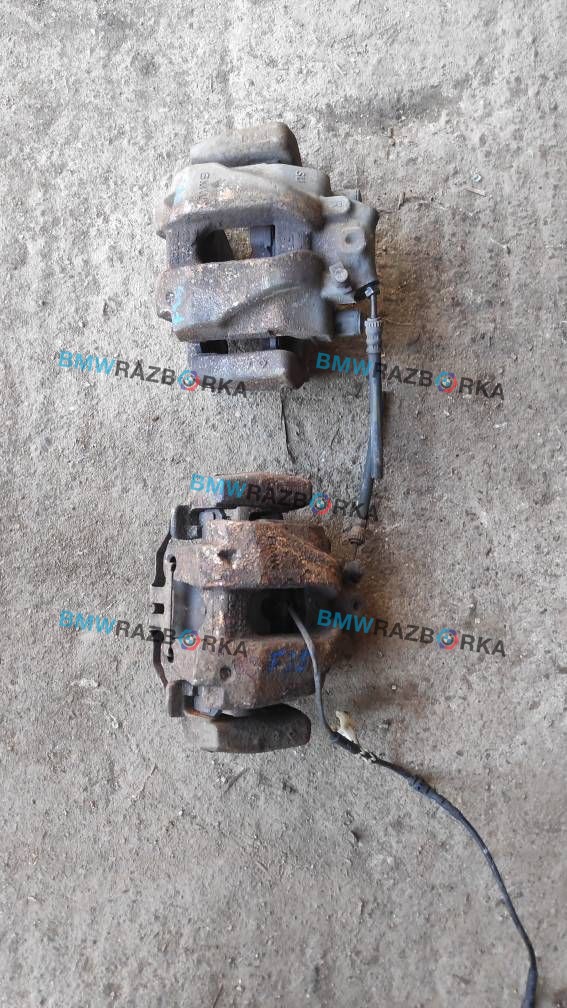 суппорт передний левый BMW X3 F25 2012, 3.0 л., бензин, АКПП, внедорожник 5 дв.