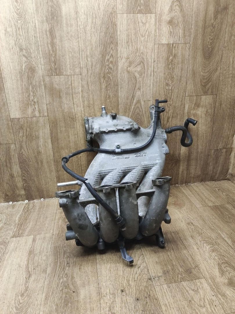 коллектор впускной Volkswagen Jetta 4 поколение 2003, 2.0 л., BEV, бензин, МКПП, седан, 06A133223NAA - фото №1