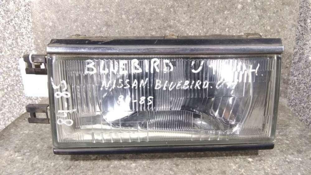 фара левая Nissan Bluebird U11 1985 - фото №1