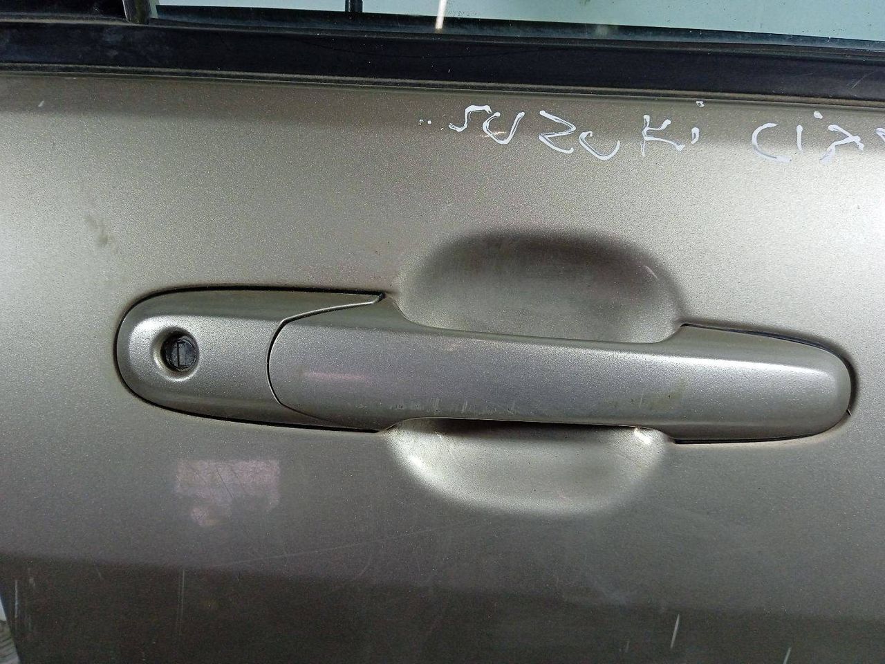 ручка наружная Suzuki Liana 1 поколение (2001 - 2004), хетчбэк 5 дв. - фото №1