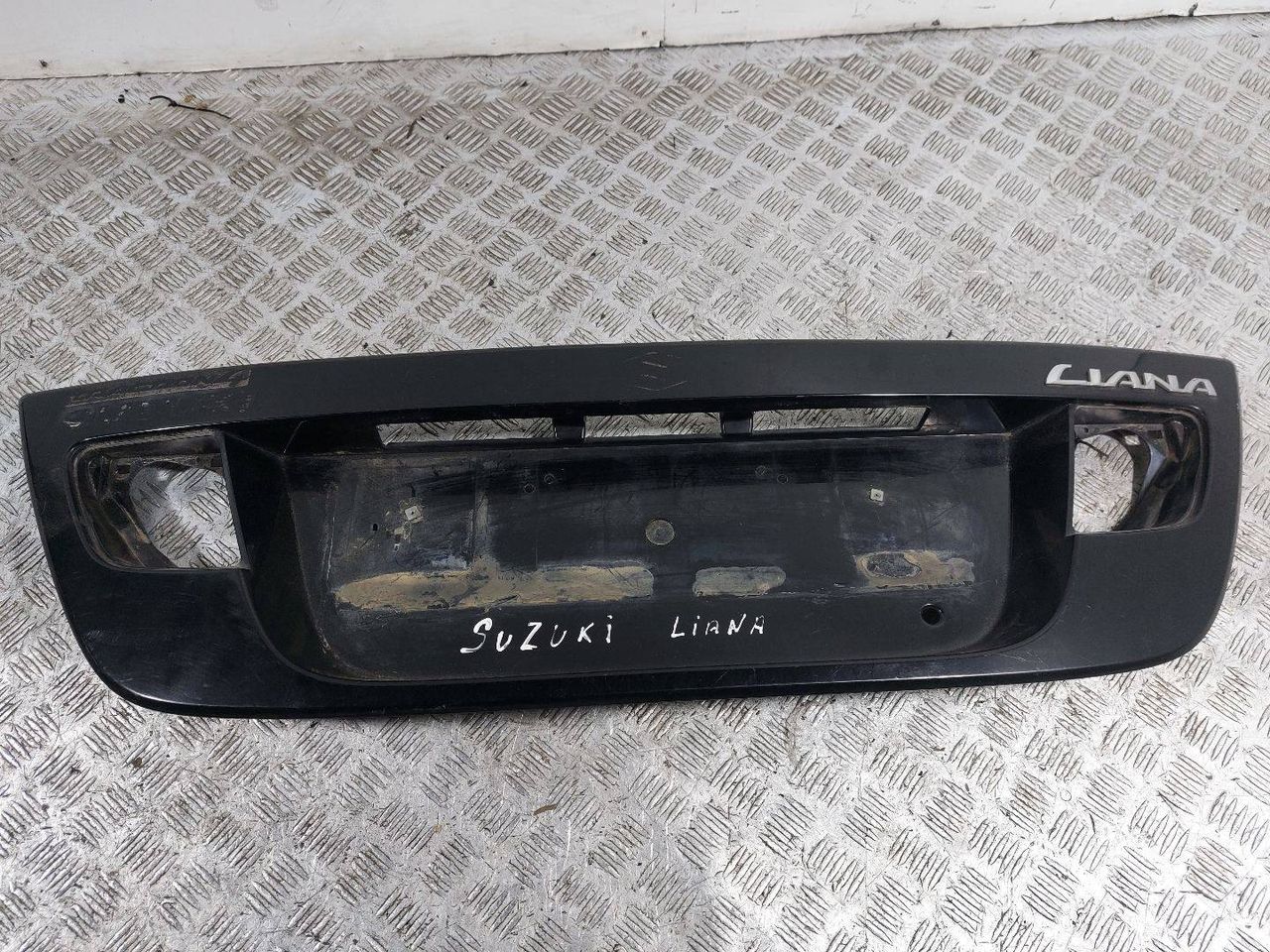 накладка подсветки номера Suzuki Liana 1 поколение (2001 - 2004), хетчбэк 5 дв., 83940-54G00 - фото №1