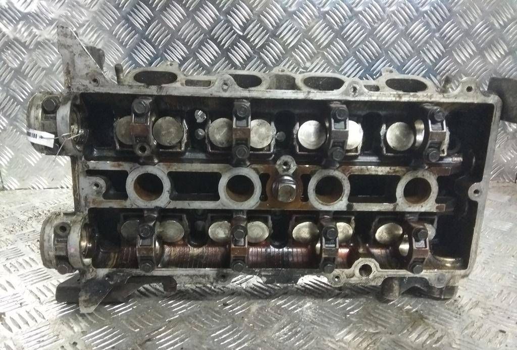 головка блока цилиндров Mazda 626 GE 1991, 2.0 л., i, бензин, АКПП, седан, передний привод, FS06-10-100 - фото №1