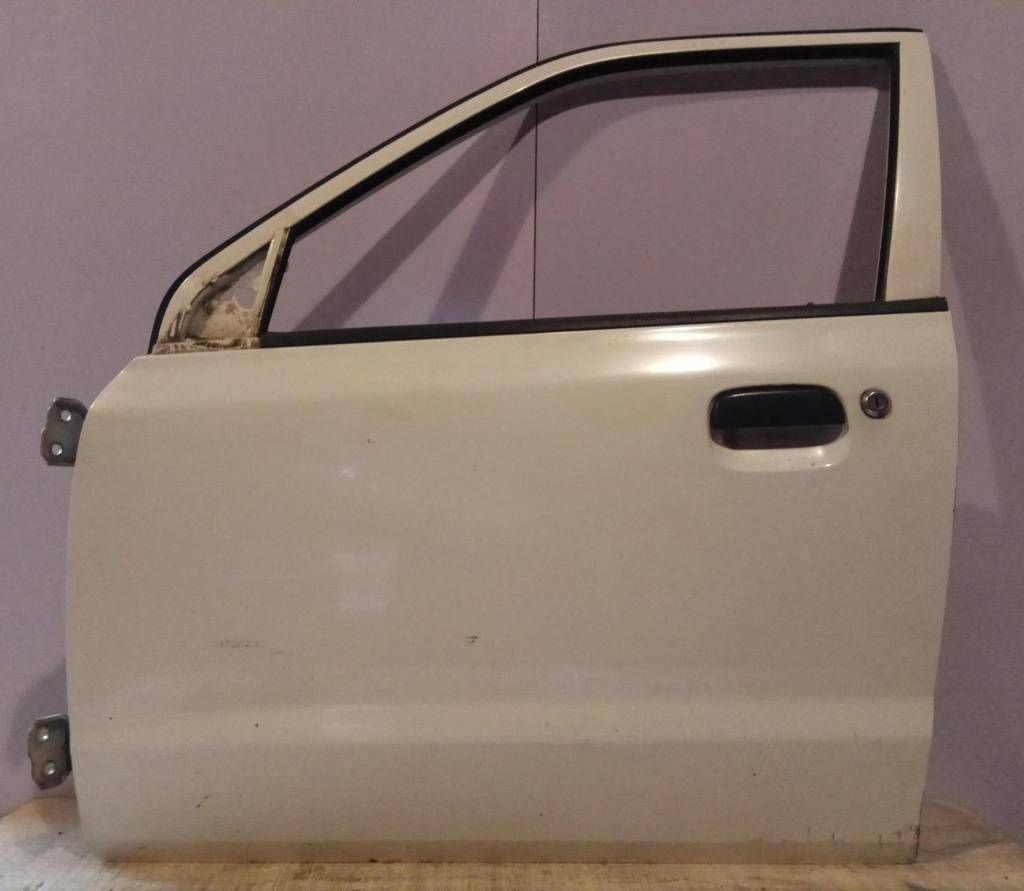 замок двери передней левой Suzuki Alto 5 поколение 2003, 1.1 л., i, F10D, бензин, 4МКПП, белый, хетчбэк 5 дв., передний привод, 82202M79G00 - фото №1